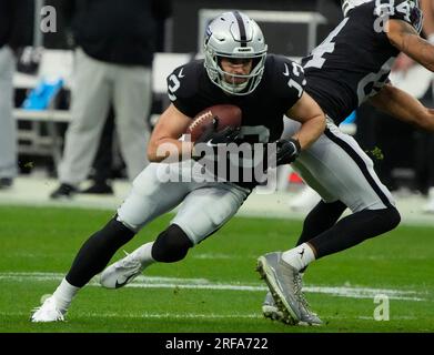 FILE - Las Vegas Raiders wide receiver Hunter Renfrow (13) runs