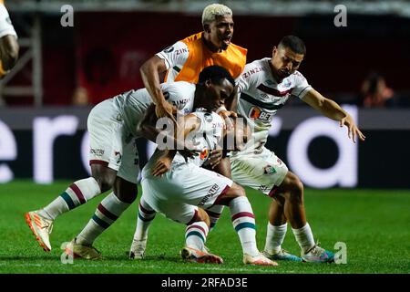 Samuel Xavier of Brazil's Fluminense, center, and Rene of Brazil's  Internacional head the ball during a Copa Libertadores semifinal second leg  soccer match at Beira Rio stadium in Porto Alegre, Brazil, Wednesday