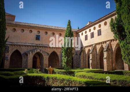 Cistercian cloister of the Monasterio de Piedra in Zaragoza, Aragon, Spain with vegetation inside Stock Photo