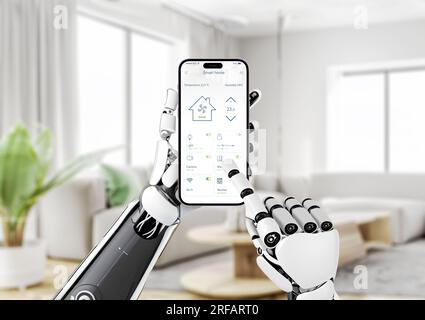 Robot controls the temperature and other parameters of the smart house with the mobile app. The concept of technology development and service manageme Stock Photo