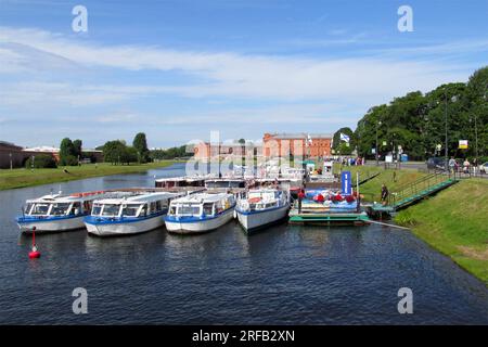 Saint Petersburg, Russia - July 29, 2023: Pleasure boats at the pier in St. Petersburg Stock Photo
