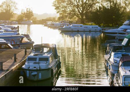 Boats on the river Waveney at the Quay in Beccles at sunset , Suffolk , England , Britain , UK Stock Photo