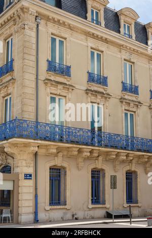 Beautiful old building with blue iron railing, Marseillan, Herault, Occitanie, France Stock Photo