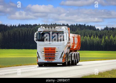 Beautifully customised new Volvo FH16 tipper truck on highway 2 on a day of summer. Jokioinen, Finland. July 21, 2023. Stock Photo