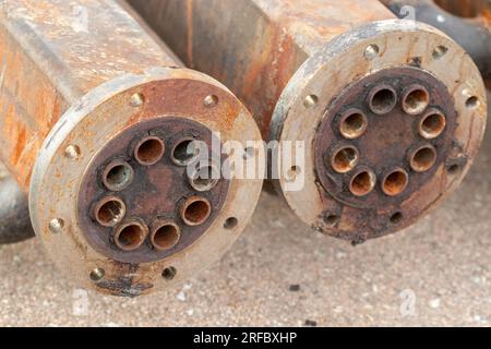 Old rusty extrusion tubing steal back ground . High quality photo Stock Photo