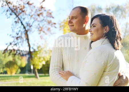 Man Pose Looking Away While Woman Looks At The Camera Stock Photo -  Download Image Now - iStock