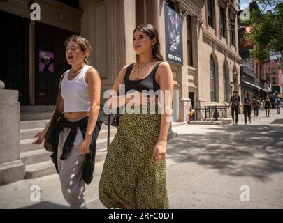 The hot weather doesn’t deter people from coming out in Chelsea in New York in the middle of a heat wave on Saturday, July 29, 2023. The city is under a heat advisory as temperature go up during the first heat wave of the summer. (© Richard B. Levine) Stock Photo