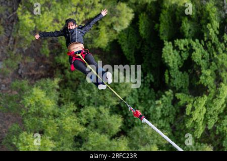 Bungy Jumping from the Kawarau Bridge bungy birthplace over the Kawarau Gorge near Queestown, South Island, New Zealand. Photo: Rob Watkins Stock Photo