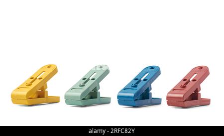 set of colorful clips, plastic paper or laundry clips, clothespin or clothes pegs isolated on white background Stock Photo