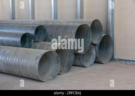 Sheet metal spiral duct in industrial manufacturing warehouse ...