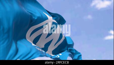 Marseille, FR, June 10 2023; Flag of Olimpique de Marseille football club waving on a clear day. French Ligue 1 Professional football team. Illustrati Stock Photo