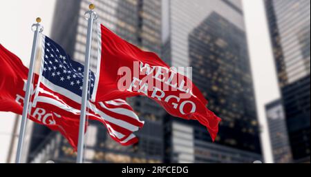 San Francisco, US, Aug. 1 2023: Wells Fargo bank and the United States flags waving in a financial district. Illustrative editorial 3d illustration. F Stock Photo