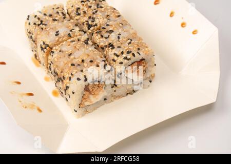 Sushi with cream cheese and tuna isolated on a white background. Stock Photo