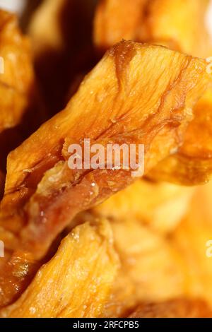 Sun dried pineapple slices pieces of small fruits on white background close up botanical healthy eating concept big size high quality instant stock ph Stock Photo