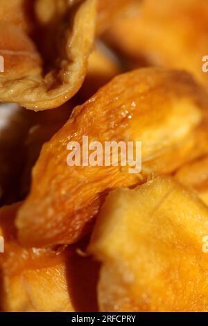Sun dried pineapple slices pieces of small fruits on white background close up botanical healthy eating concept big size high quality instant stock ph Stock Photo