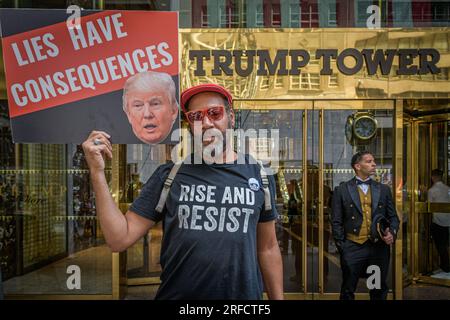 In the wake of the latest Special Counsel Jack Smith's indictement of Donald Trump, members of the activist group Rise and Resist and allies gathered outside Trump Tower in Manhattan on August 2, 2023 demanding state governments to disqualify former President Trump from appearing on ballots in 2024 under the 14th Amendment. The group stated that secretaries of state are empowered by the 14th Amendment to bar Trump from running for office because of his incitement of the January 6, 2021 Capitol insurrection. (Photo by Erik McGregor/Sipa USA) Stock Photo