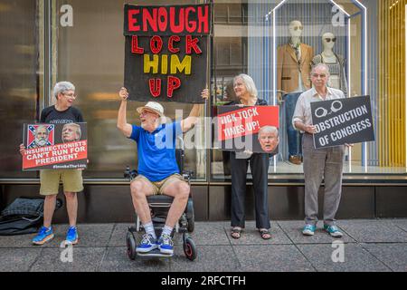 In the wake of the latest Special Counsel Jack Smith's indictement of Donald Trump, members of the activist group Rise and Resist and allies gathered outside Trump Tower in Manhattan on August 2, 2023 demanding state governments to disqualify former President Trump from appearing on ballots in 2024 under the 14th Amendment. The group stated that secretaries of state are empowered by the 14th Amendment to bar Trump from running for office because of his incitement of the January 6, 2021 Capitol insurrection. (Photo by Erik McGregor/Sipa USA) Stock Photo