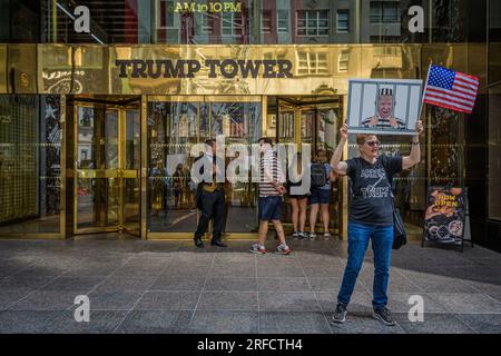 In the wake of the latest Special Counsel Jack Smith's indictement of Donald Trump, members of the activist group Rise and Resist and allies gathered outside Trump Tower in Manhattan on August 2, 2023 demanding state governments to disqualify former President Trump from appearing on ballots in 2024 under the 14th Amendment. The group stated that secretaries of state are empowered by the 14th Amendment to bar Trump from running for office because of his incitement of the January 6, 2021 Capitol insurrection. (Photo by Erik McGregor/Sipa USA) Stock Photo