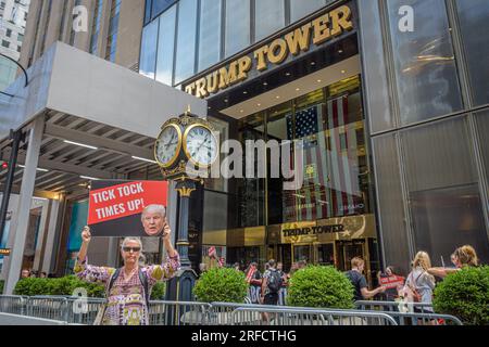 In the wake of the latest Special Counsel Jack Smith's indictement of Donald Trump, members of the activist group Rise and Resist and allies gathered outside Trump Tower in Manhattan on August 2, 2023 demanding state governments to disqualify former President Trump from appearing on ballots in 2024 under the 14th Amendment. The group stated that secretaries of state are empowered by the 14th Amendment to bar Trump from running for office because of his incitement of the January 6, 2021 Capitol insurrection. (Photo by Erik McGregor/Sipa USA) Stock Photo