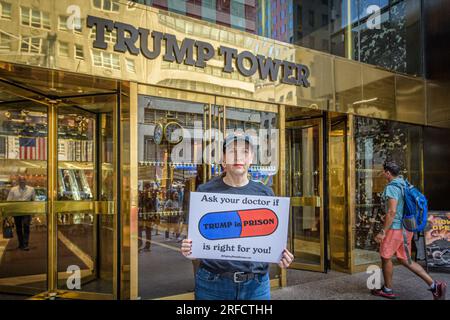 In the wake of the latest Special Counsel Jack Smith's indictement of Donald Trump, members of the activist group Rise and Resist and allies gathered outside Trump Tower in Manhattan on August 2, 2023 demanding state governments to disqualify former President Trump from appearing on ballots in 2024 under the 14th Amendment. The group stated that secretaries of state are empowered by the 14th Amendment to bar Trump from running for office because of his incitement of the January 6, 2021 Capitol insurrection. (Photo by Erik McGregor/Sipa USA) Stock Photo