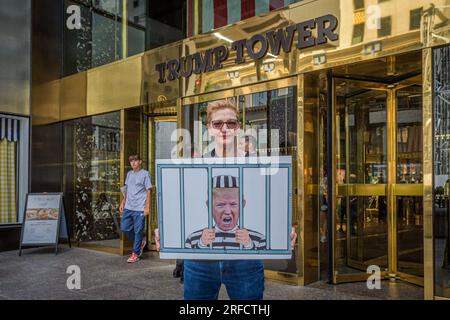 In the wake of the latest Special Counsel Jack Smith's indictement of Donald Trump, members of the activist group Rise and Resist and allies gathered outside Trump Tower in Manhattan on August 2, 2023 demanding state governments to disqualify former President Trump from appearing on ballots in 2024 under the 14th Amendment. The group stated that secretaries of state are empowered by the 14th Amendment to bar Trump from running for office because of his incitement of the January 6, 2021 Capitol insurrection. (Photo by Erik McGregor/Sipa USA) Stock Photo