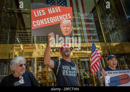 In the wake of the latest Special Counsel Jack Smith's indictement of Donald Trump, members of the activist group Rise and Resist and allies gathered outside Trump Tower in Manhattan on August 2, 2023 demanding state governments to disqualify former President Trump from appearing on ballots in 2024 under the 14th Amendment. The group stated that secretaries of state are empowered by the 14th Amendment to bar Trump from running for office because of his incitement of the January 6, 2021 Capitol insurrection. (Photo by Erik McGregor/Sipa USA) Stock Photo