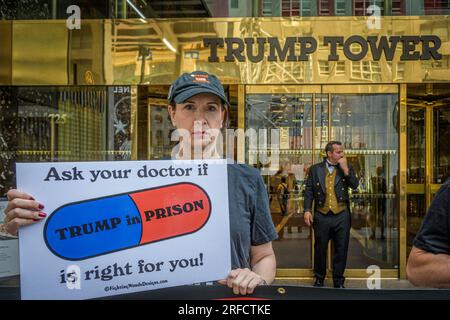 In the wake of the latest Special Counsel Jack Smith's indictement of Donald Trump, members of the activist group Rise and Resist and allies gathered outside Trump Tower in Manhattan on August 2, 2023 demanding state governments to disqualify former President Trump from appearing on ballots in 2024 under the 14th Amendment. The group stated that secretaries of state are empowered by the 14th Amendment to bar Trump from running for office because of his incitement of the January 6, 2021 Capitol insurrection. (Photo by Erik McGregor/Sipa USA) Stock Photo