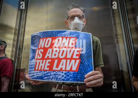 In the wake of the latest Special Counsel Jack Smith's indictement of Donald Trump, members of the activist group Rise and Resist and allies gathered outside Trump Tower in Manhattan on August 2, 2023 demanding state governments to disqualify former President Trump from appearing on ballots in 2024 under the 14th Amendment. The group stated that secretaries of state are empowered by the 14th Amendment to bar Trump from running for office because of his incitement of the January 6, 2021 Capitol insurrection. (Photo by Erik McGregor/Sipa USA) Stock Photo