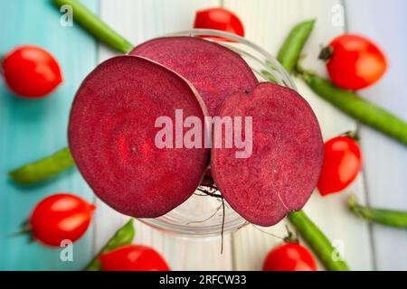 sliced beetroot on wood background Stock Photo