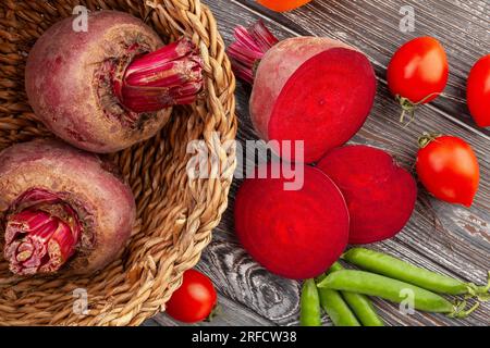 sliced beetroot on wood background Stock Photo