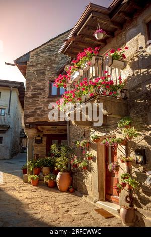 Typical street of the historic center of Puebla de Sanabria, Zamora, Castilla y Leon, Spain with balconies with flowers Stock Photo