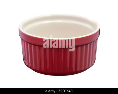 Red round empty porcelain ramekin on a white background Stock Photo