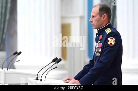 Moscow, Russia. 02nd Aug, 2023. Colonel Dmitry Makarov, delivers remarks after he was awarded with the Order of Courage, during a ceremony to present state awards to military personnel who served in the invasion of Ukraine and to prominent Russian citizens for achievements in a variety of fields at St. Catherine Hall of the Kremlin Palace, August 2, 2023 in Moscow, Russia. Credit: Alexander Kazakov/Kremlin Pool/Alamy Live News Stock Photo