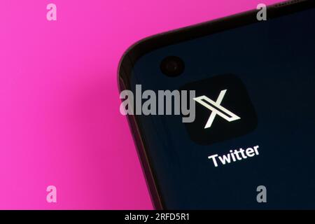 Twitter X app logo seen on screen of smartphone. Twitter rebrands as X app (also known as an “everything app”). Stafford, United Kingdom, August 2, 20 Stock Photo