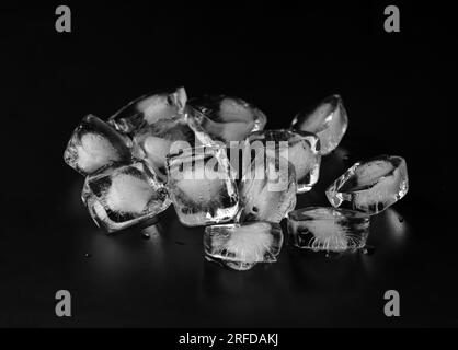 Ice cubes isolated on black background Stock Photo