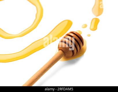 Wooden dipper with honey isolated on a white background. Golden organic floral honey natural. Abstract illustration of honey and dipper. Drops of hone Stock Photo