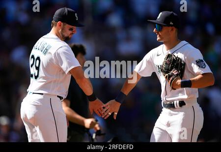 Seattle Mariners' Julio Rodríguez holds a trident in the dugout after  hitting a home run in a baseball game against the Texas Rangers, Thursday,  Sept. 28, 2023, in Seattle. (AP Photo/Lindsey Wasson