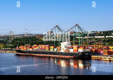 Halifax, Canada - July 19, 2023: The NYK Rumina container ship, based out of Singapore, docked at the Fairview Cove Container Terminal in the Bedford Stock Photo
