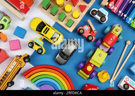 Different children's toys on color background, flat lay Stock Photo