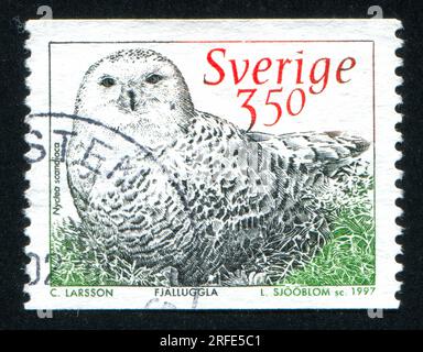 SWEDEN - CIRCA 1997: stamp printed by Sweden, shows Snowy Owl, circa 1997 Stock Photo