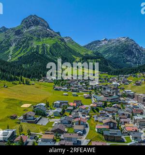 The glamorous mountain resort of Lech am Arlberg in summertime, aerial view to Lech and Oberlech Stock Photo