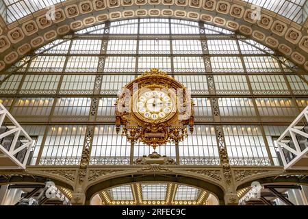 Ornamental golden clock in Orsay Museum, French: Musee d Orsay, in former train station building, Paris, France. Stock Photo