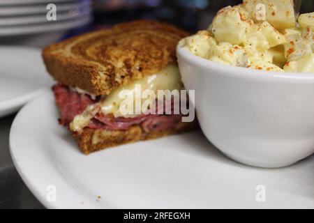 ''A Lunch Special Of A Rueben Sandwich With A Potato Salad'. Stock Photo