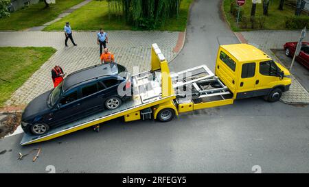 Recovery tow truck takes away car wreck in Havirov, Czech Republic, August 2, 2023. (CTK Photo/Petr Sznapka) Stock Photo