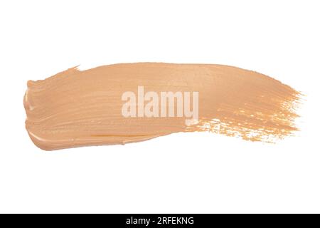 Gently beige strokes and texture of face highlighter or acrylic paint isolated on white background Stock Photo