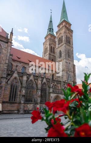 Nuremberg, Germany - July 19, 2023: View of St. Sebaldus Church in historical center of Nurnberg, Franconia, Bavaria  Stock Photo