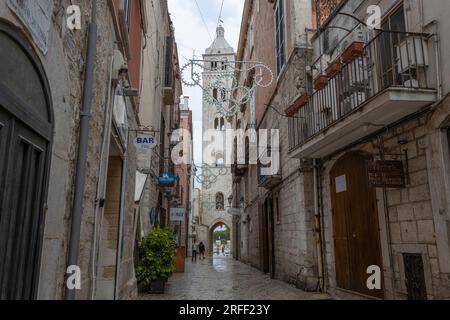 BARLETTA, ITALY, JULY 8, 2022 - View of the historic center of the city of Barletta, with the church tower of the Basilica Co-Cathedral of Santa Maria Stock Photo