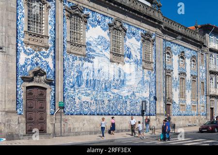 Porto, Portugal.  Azulejos decorating the exterior of the Igreja do Carmo.  The church was built in the mid-18th century.  The tiles, designed by Silv Stock Photo