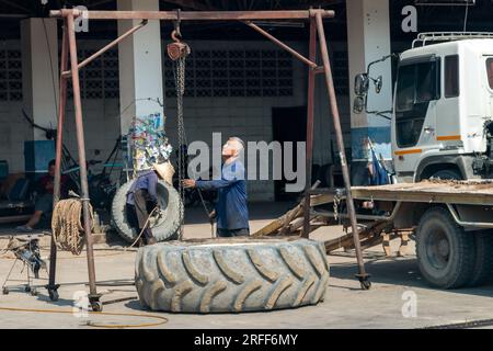 THAILAND, FEB 26 2023, The man works in a tire service Stock Photo