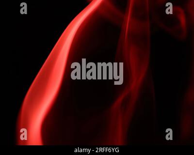 Red smoke on a dark background, patterns, Red fog abstract Stock Photo
